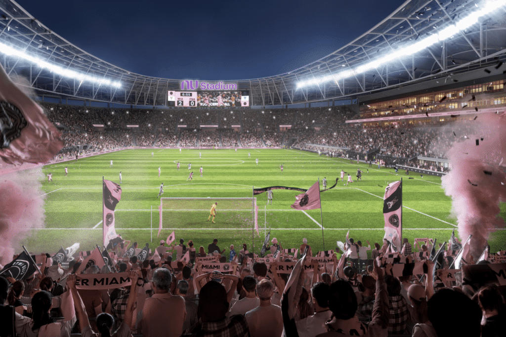 Players standing on soccer field with long shadows cast across the grass