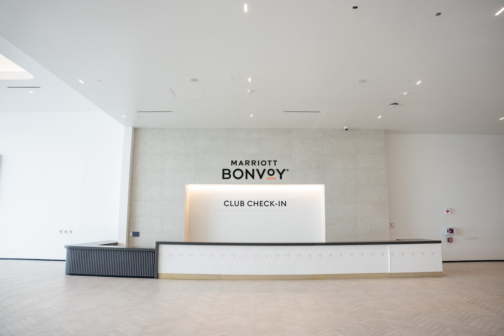 Marriott Bonvoy Club check-in counter at Inter Miami CF's NU Stadium, featuring a modern reception area.