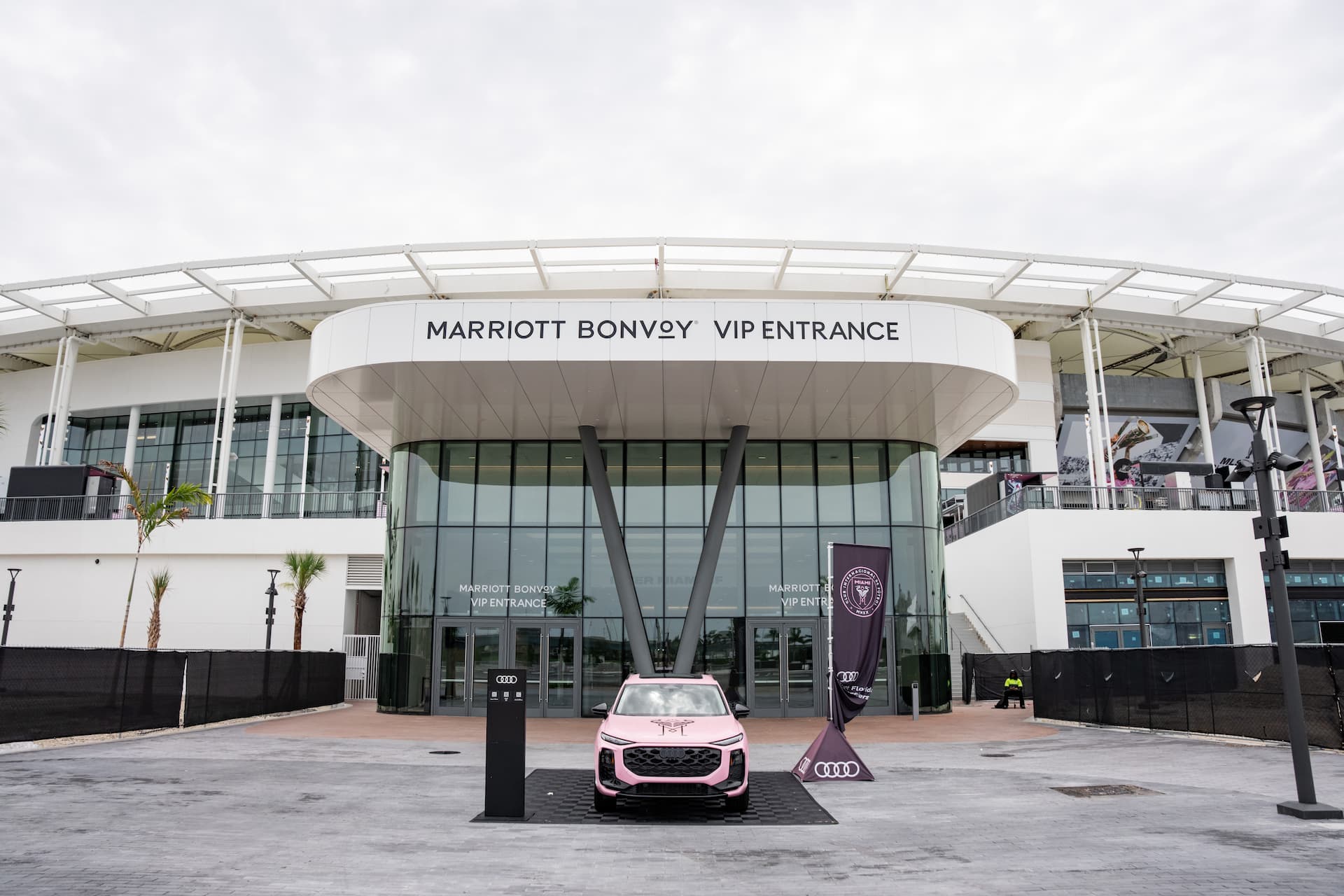 Marriott Bonvoy VIP entrance at Inter Miami CF's NU Stadium, featuring a pink Audi vehicle outside the stadium.