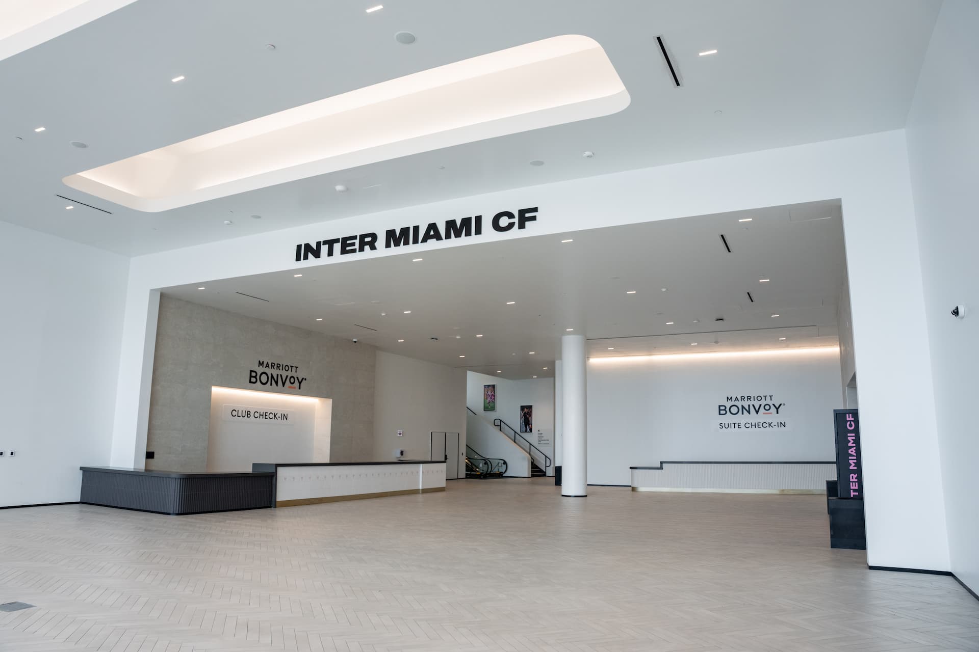 Inter Miami CF stadium lobby featuring Marriott Bonvoy club and suite check-in counters.